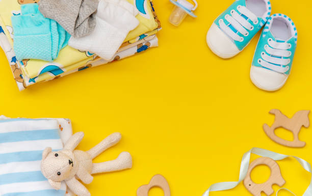 istock baby accessories for newborns on a colored background. selective focus. 1147275806