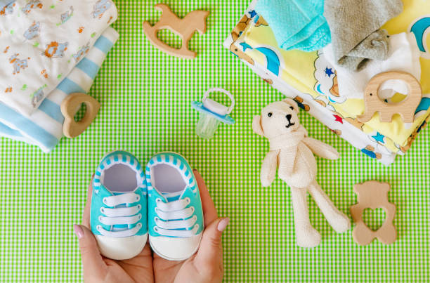 istock baby accessories for newborns on a colored background. selective focus. 1147275807
