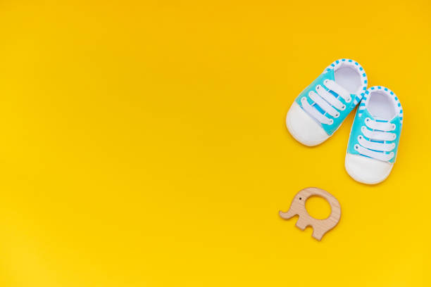 istock baby accessories for newborns on a colored background. selective focus. 1147275818