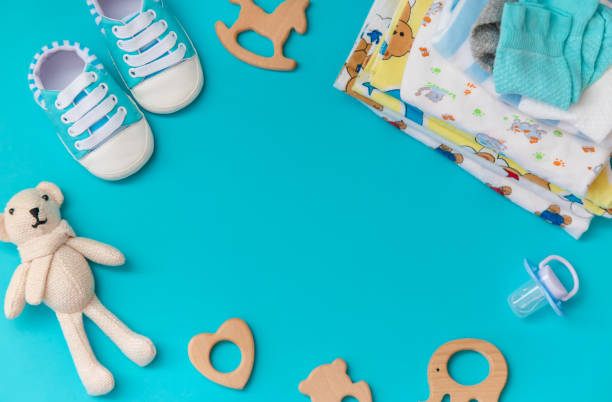 istock baby accessories for newborns on a colored background. selective focus. 1147275828