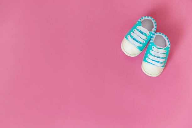istock baby accessories for newborns on a colored background. selective focus. 1147275841