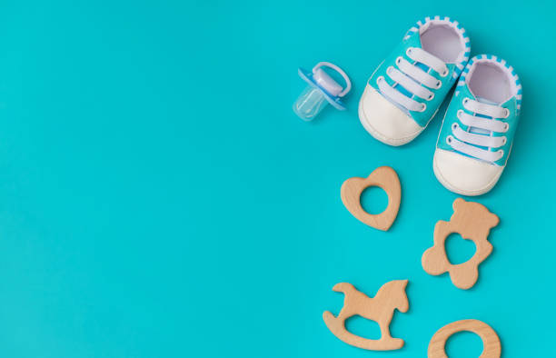baby accessories for newborns on a colored background. selective focus.