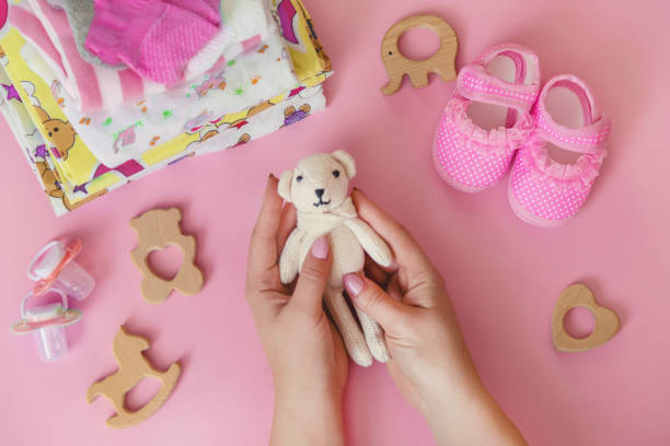 istock baby accessories for newborns on a colored background. selective focus. 1147275919