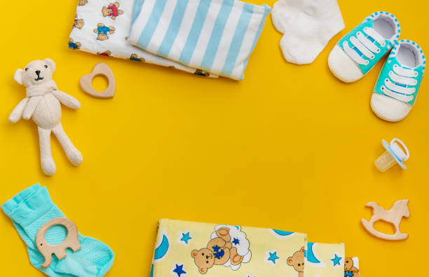 istock baby accessories for newborns on a colored background. selective focus. 1147275948