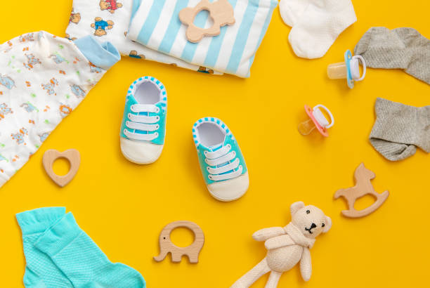 istock baby accessories for newborns on a colored background. selective focus. 1147275953