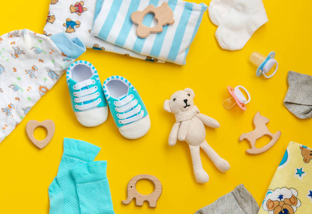 istock baby accessories for newborns on a colored background. selective focus. 1147275961