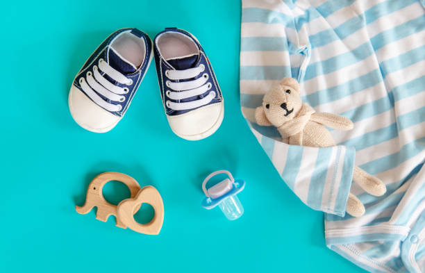 istock baby accessories for newborns on a colored background. selective focus. 1147275976