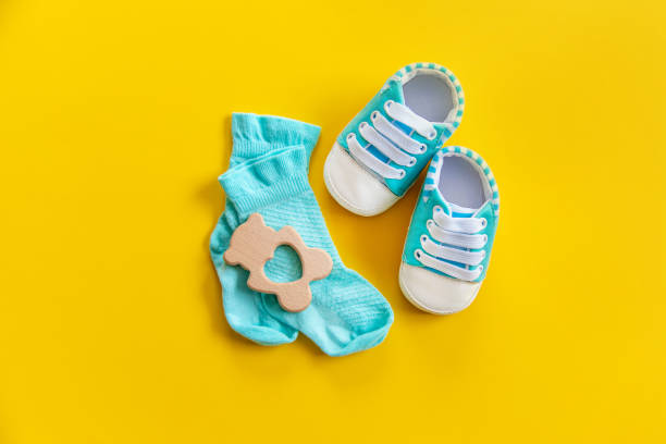 istock baby accessories for newborns on a colored background. selective focus. 1147275992