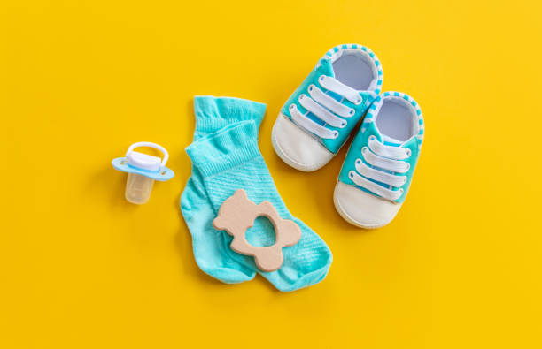 istock baby accessories for newborns on a colored background. selective focus. 1147276002