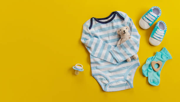 istock baby accessories for newborns on a colored background. selective focus. 1147276004