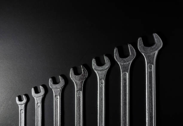 istock top view of silver wrench sort by small to large on dark light 1147276620