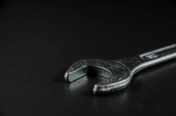 wrench in hand as a repair symbol