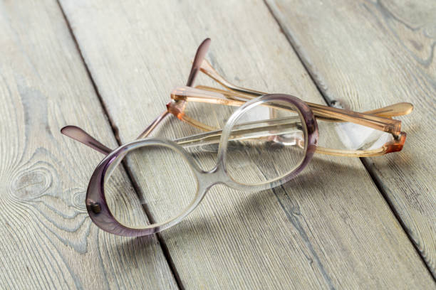 istock eyeglasses on wooden table 1147276808