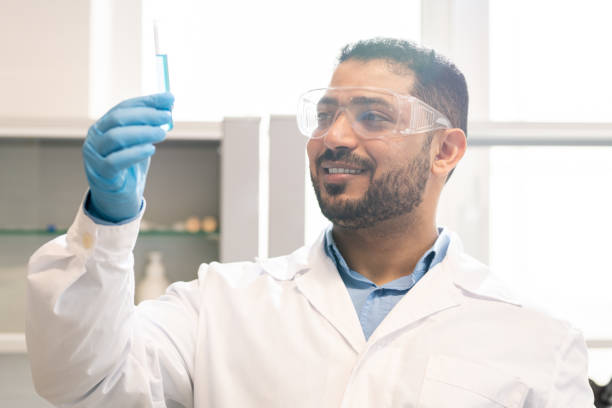 istock Satisfied scientist inventing medication 1147276925