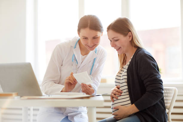 istock Pregnant Woman Visiting Doctor 1147277716