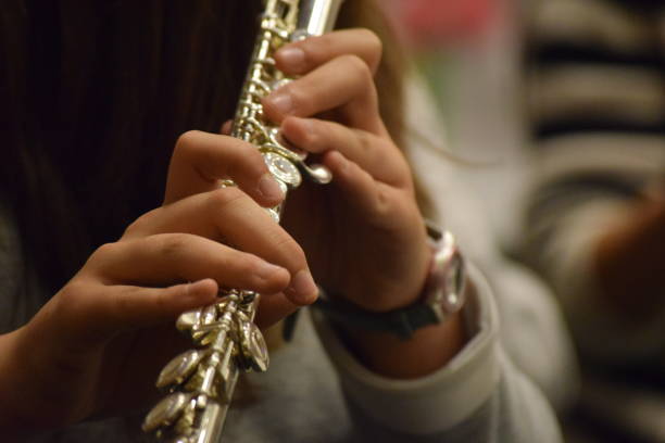 istock young hands playing a musical instrument 1147277932