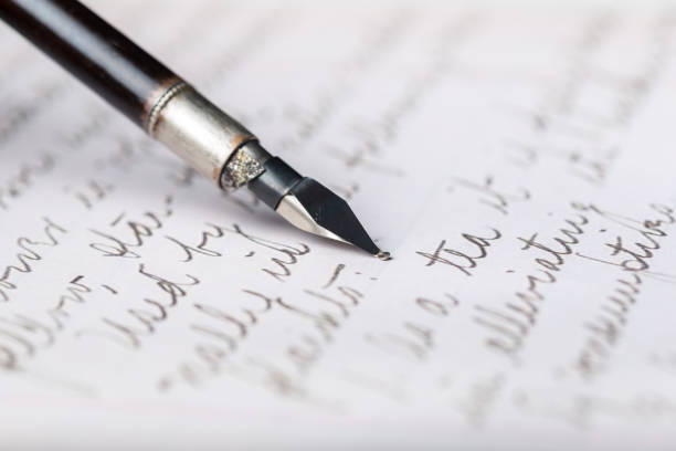 istock Fountain pen on an antique handwritten letter 1147277940