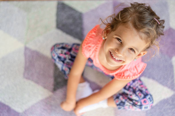 Six year old playing with a plastic airplane.More of this & other kids atBeing A Kid Lightbox