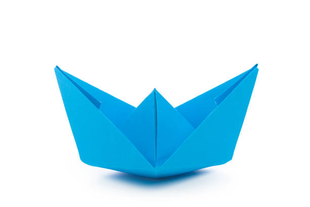 istock origami paper boat isolated on white background 1147279301
