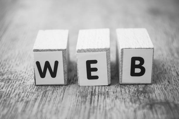 istock word on wooden cube on wooden desk background concept - WEB 1147279589