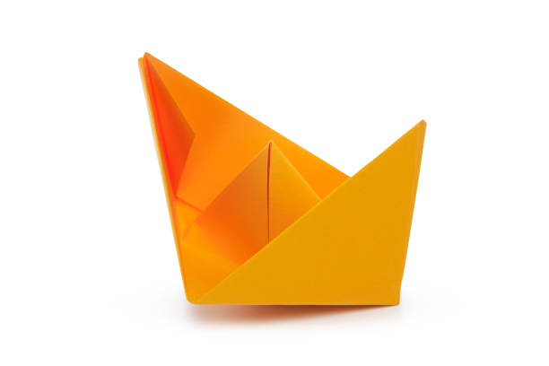 istock origami paper boat isolated on white background 1147281386