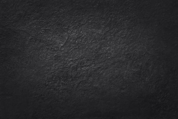 istock Dark grey black slate texture with high resolution, background of natural black stone wall. 1147281500