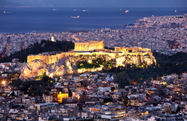 istock Athens skyline panorama with Acropolis in Greece from peak Lycabettus at night 1147281569