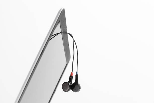 istock Music concept - Headphones over laptop 1147281967