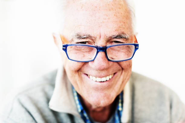 istock Friendly senior man in spectacles smiles 1147282710