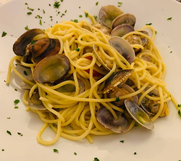 istock Pasta with vongole. Spaghetti with claims on the plate 1147284173