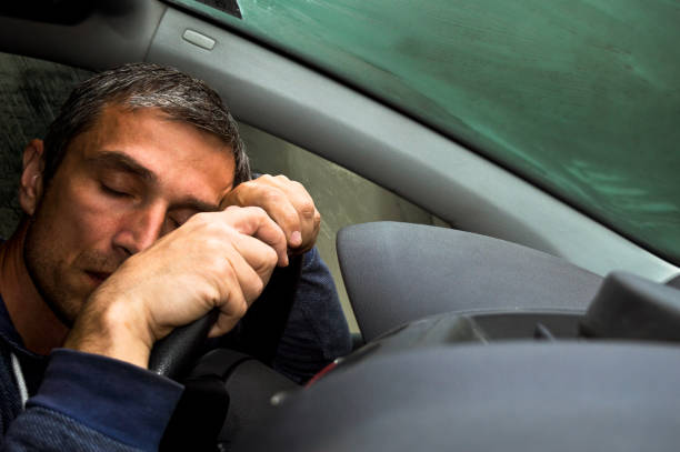Beautiful woman sleeping in a car