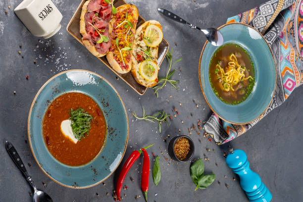 istock two plates of delicious soup with bruschettas serving 1147286036