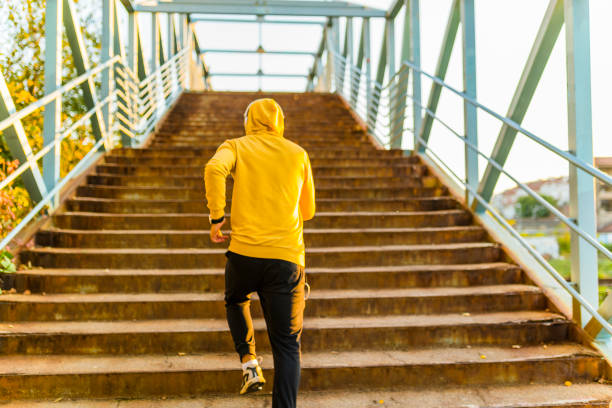istock Young Athlete Running on the Stairways 1147286224