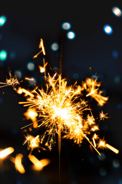 istock Burning sparkler with bokeh light background 1147286927