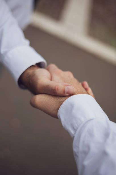 istock Businessman handshake - partnership 1147289140