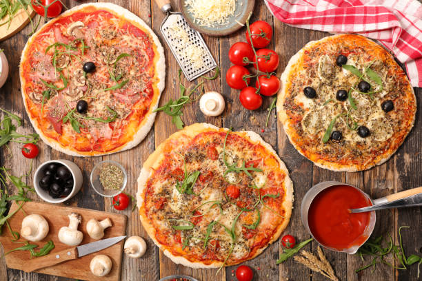 istock pizza with tomato sauce, cheese and olive 1147291067
