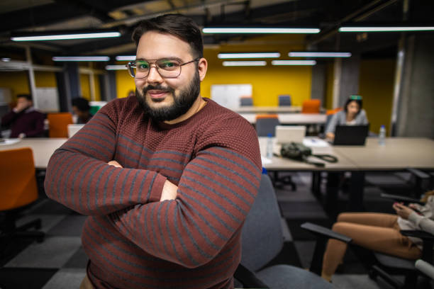istock Portrait of overweight man at work 1147294200