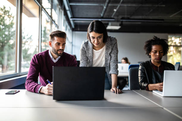 istock Coworkers working in modern office 1147294234