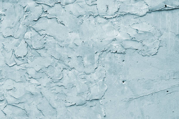 istock Grunge blue painted rough textured wall 1147294962