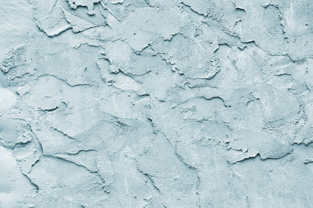 istock Grunge blue painted rough textured wall 1147295557