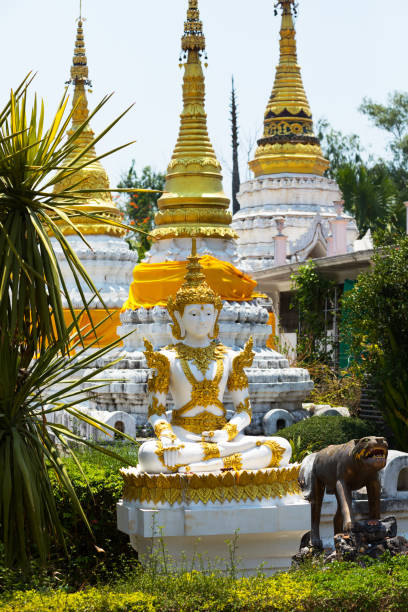 istock Thai white-golden colored  statue and pagodas 1147295696