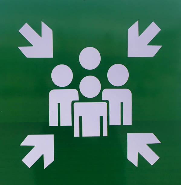 istock Green Emergency assembly point signboard 1147298137