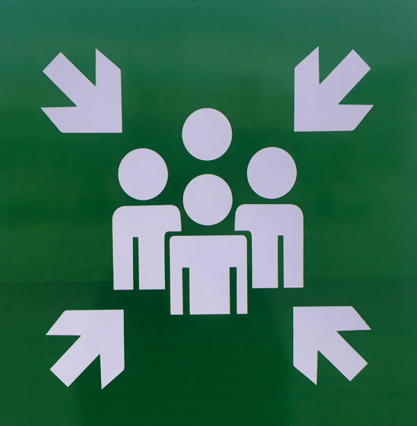 Green Emergency assembly point signboard stock photo