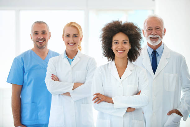 istock Group of doctors looking at the camera. 1147301251