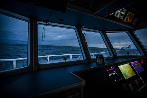 Fishing boats out for skrei cod in the arctic sea