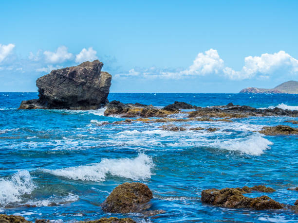 istock Ocean surf on the rocky beach 1147305045