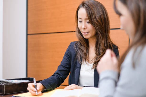 istock Consultant giving advise to customer in conference room 1147306490