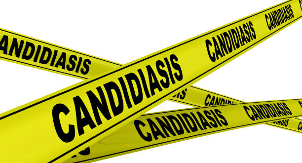 istock Candidiasis. Yellow warning tapes 1147308655