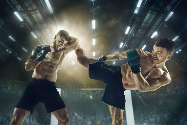 istock Two professional boxers boxing on the ring 1147311205