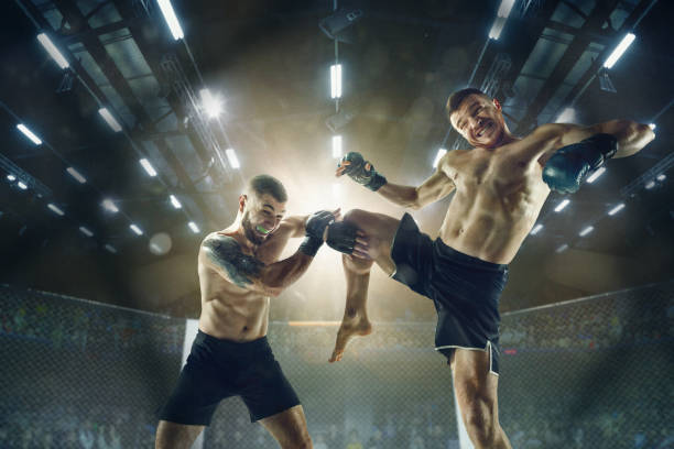 istock Two professional boxers boxing on the ring 1147311206